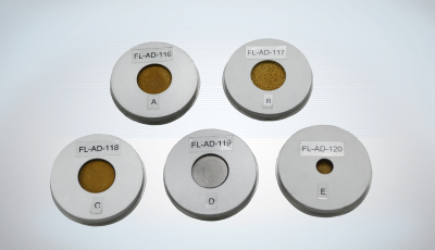 Five Calibration Disks of sintered bronze and stainless steel Five Flow Calibration Disks